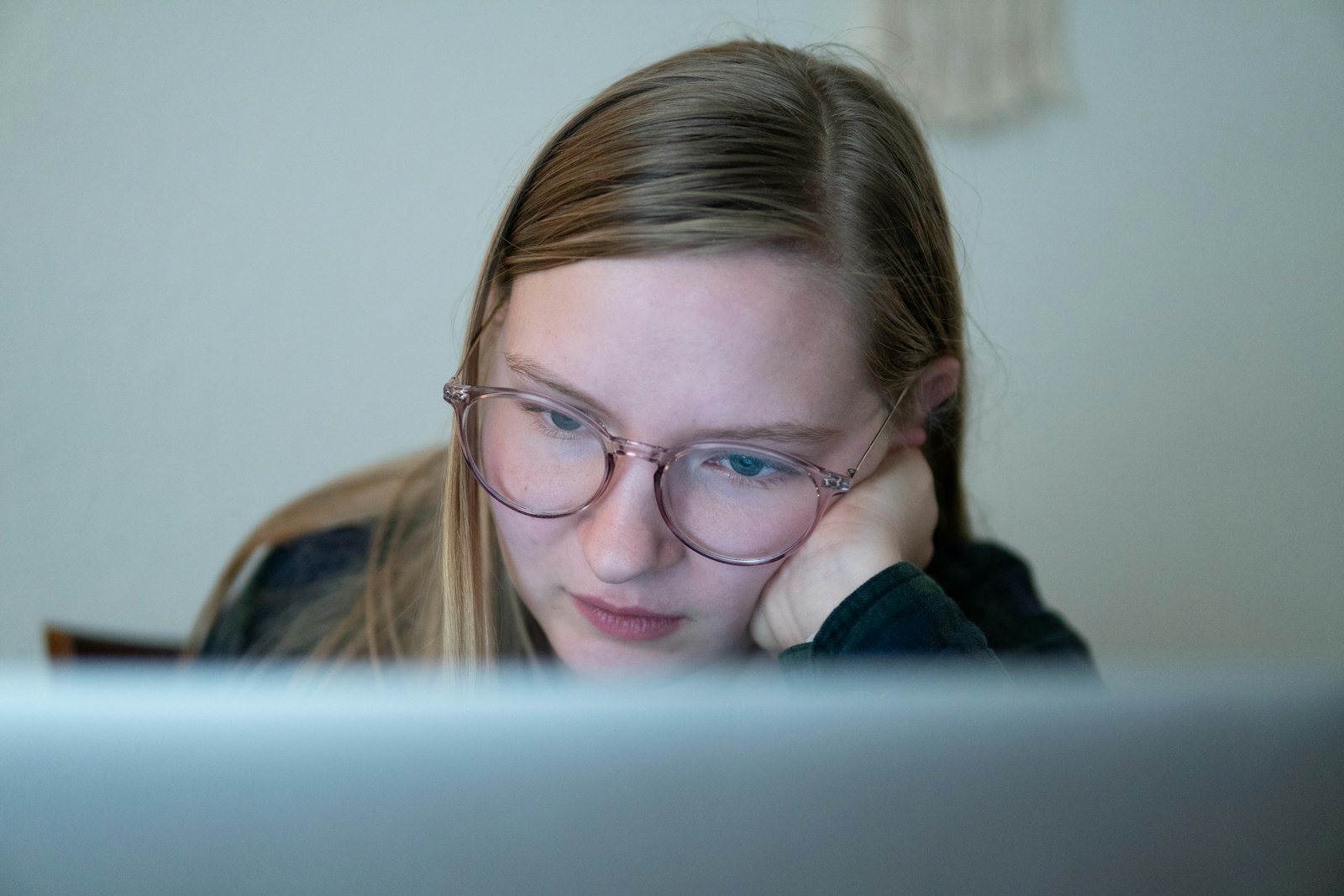 Employee looking uncertain at a computer screen